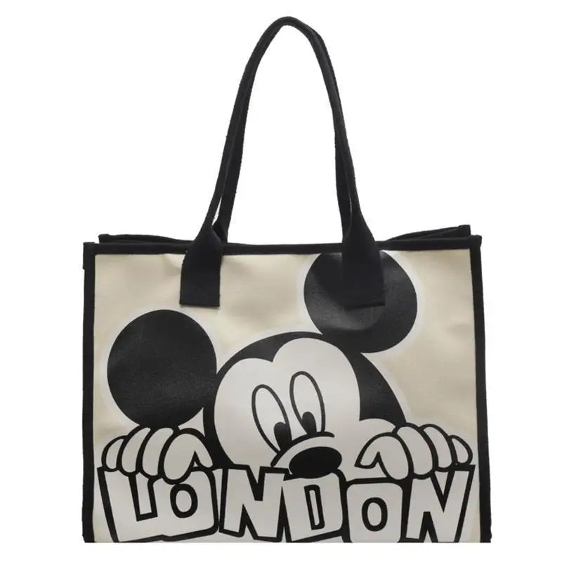 New Disney Mickey Canvas Bag Women's Versatile Casual Shoulder Bag Commuter Handbag Large Capacity Multifunctional Mommy Bag.