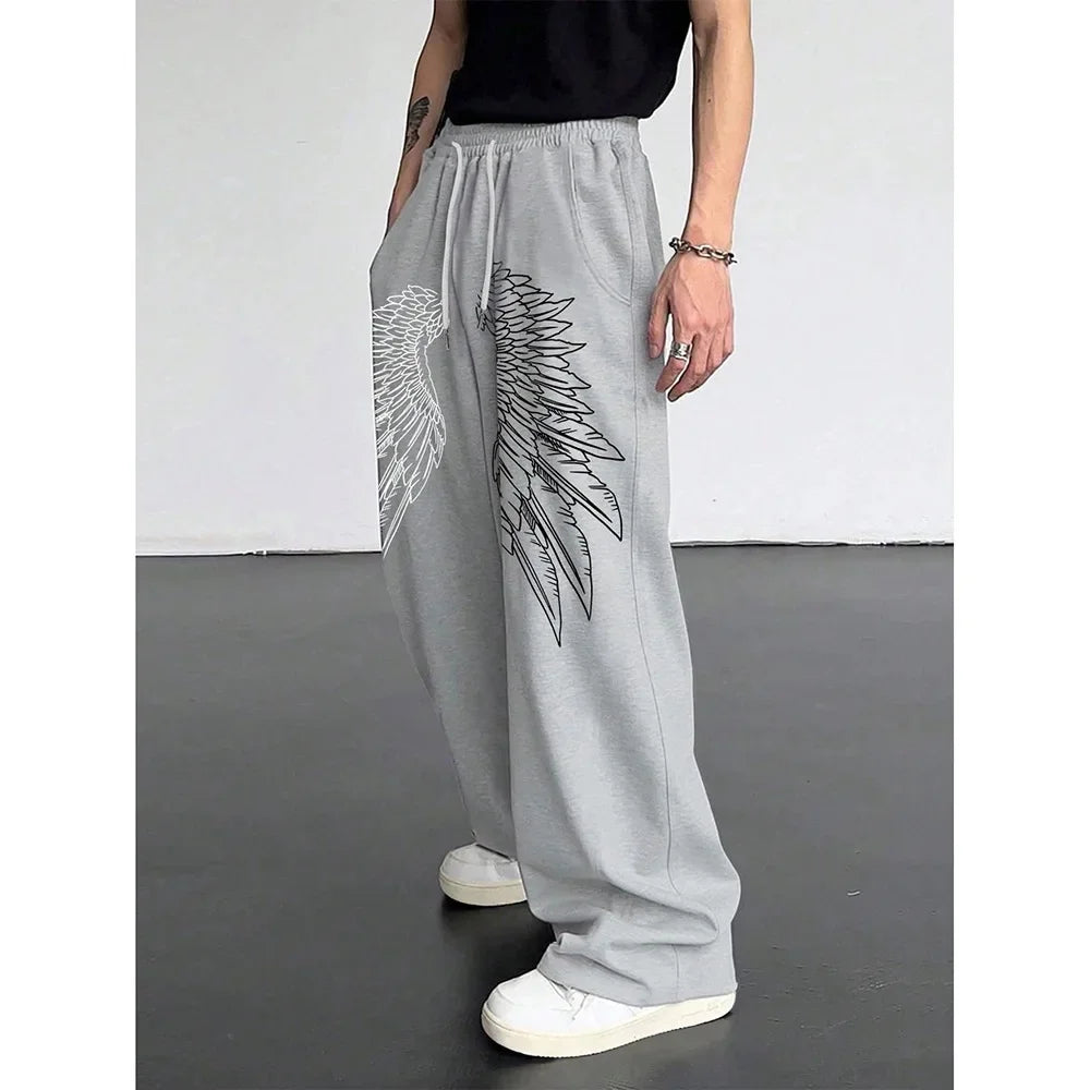 Retro Printed Casual Men's Pants Loose Wide Leg Summer 2025 New Style Versatile Long Trousers Comfortable Fit Sports Style.