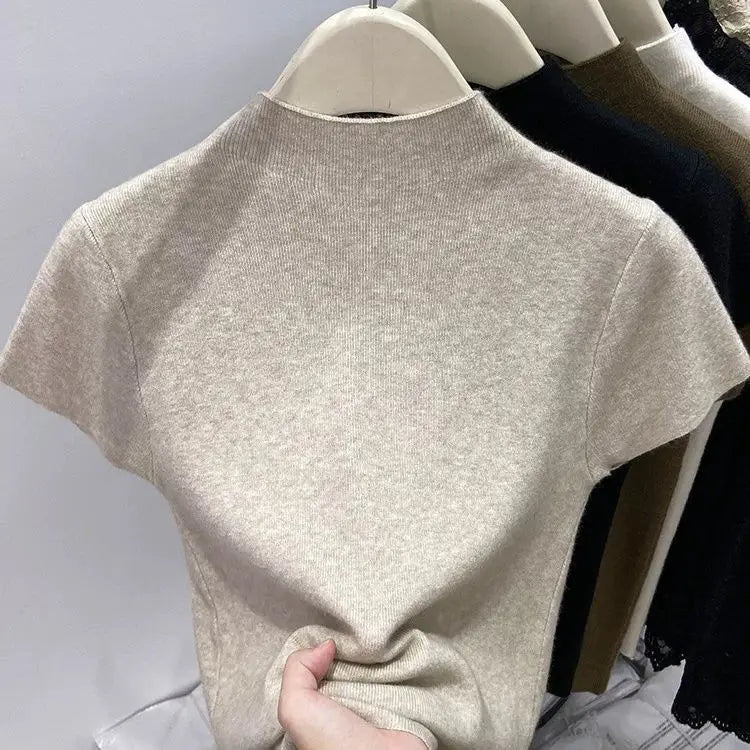 2025 grundlegende Rollkragen Solide Dünne Sommer Pullover Frauen Weibliche Gestrickte Pullover Dünne Kurzarm Bodycon Pullover.