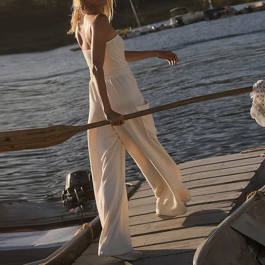 Stylish New Backless Sleeveless Commute Playsuits Women Tube Top Wide Leg Drawstring Rompers Elegant Solid Color Pocket Jumpsuit.