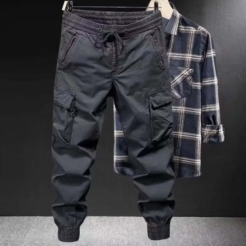 Modische Freizeit hose Herren Loose-Fit Cargo hose im Jugendstil einfarbig verkürzte trend ige Marken schuhe für den Frühling Herbst.
