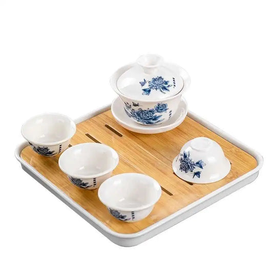1 gaiwan 4 cups 1 teaboad Ceramic kungfu tea set household one cover bowl four cups living room kungfu office reception.