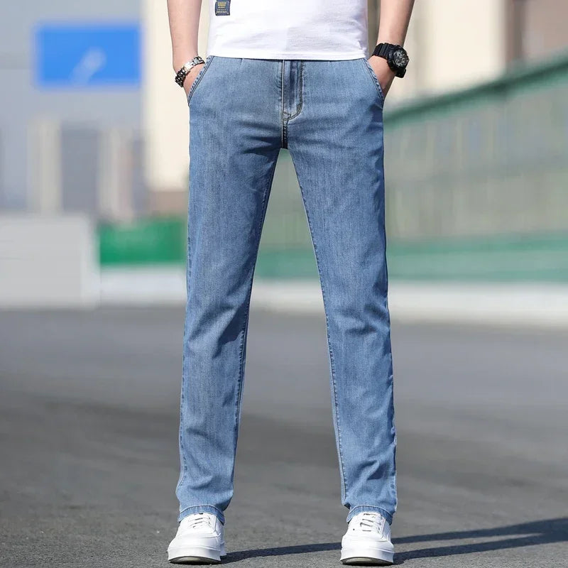 2025 sommer Neue männer Lose Grau Jeans Mode Lässig Stretch Gerade bein Denim Hosen Männlich Hellblau männer Hosen.