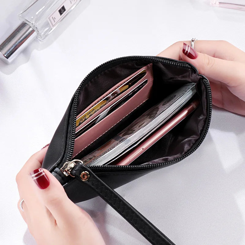 New mobile phone bag female long zipper coin purse female Korean version of pure color wild card bag mobile phone bag wallet.