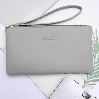 New mobile phone bag female long zipper coin purse female Korean version of pure color wild card bag mobile phone bag wallet.