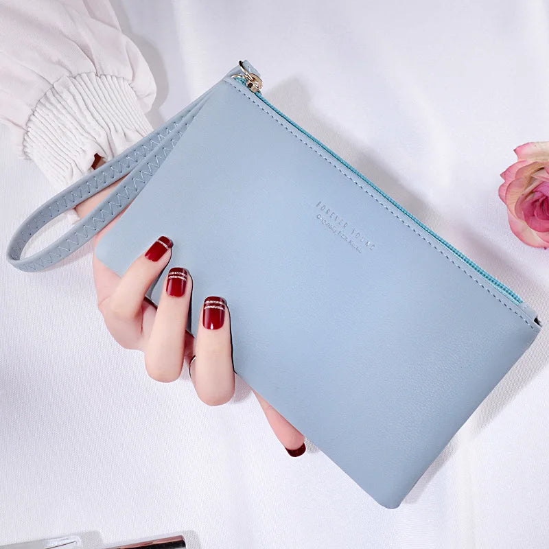 New mobile phone bag female long zipper coin purse female Korean version of pure color wild card bag mobile phone bag wallet.