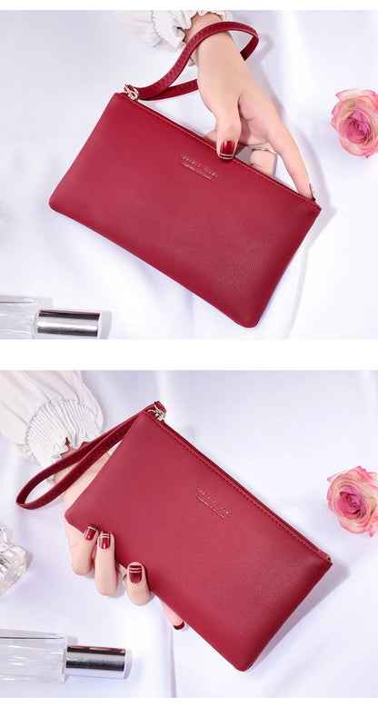 New mobile phone bag female long zipper coin purse female Korean version of pure color wild card bag mobile phone bag wallet.