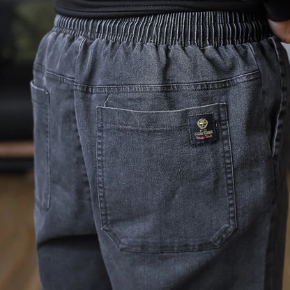 Plus Size Jeans Men Loose Joggers Streetwear Harem Jeans Cargo Pants Ankle-Length Denim Trousers.