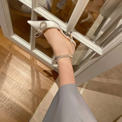 2025 New Fashion Glitter Rhinestones Women Pumps Crystal Bowknot Silk Pointed Toe Buckle Strap Thin High Heels Party Prom Shoes.