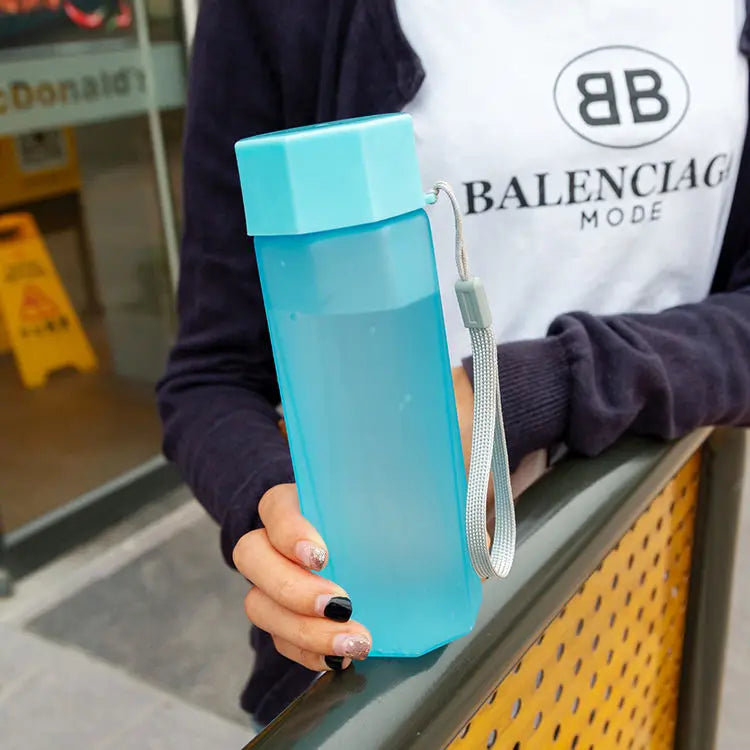 Portable Plastic Water Bottle Creative Matte Water Cup Outdoor Juice Leak-Proof Sports Bottle with Rope Travel Camping Bottles.