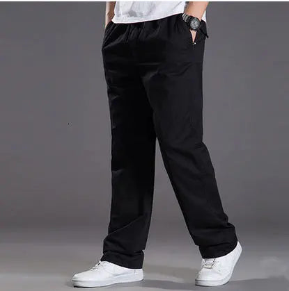 Mens casual Cargo Cotton pants men pocket loose Straight Pants Elastic Work Trousers Brand Fit Joggers Male Super Large Size 6XL.
