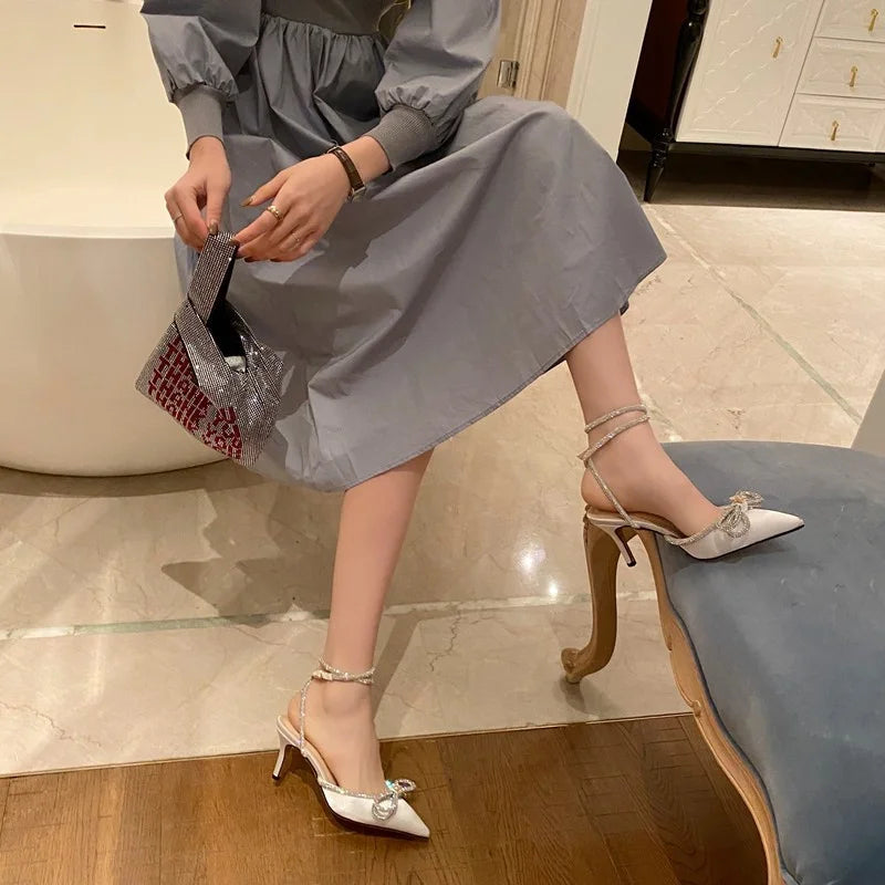 2025 New Fashion Glitter Rhinestones Women Pumps Crystal Bowknot Silk Pointed Toe Buckle Strap Thin High Heels Party Prom Shoes.
