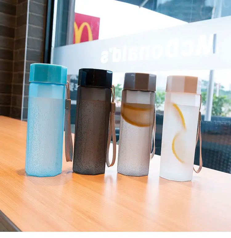 Portable Plastic Water Bottle Creative Matte Water Cup Outdoor Juice Leak-Proof Sports Bottle with Rope Travel Camping Bottles.