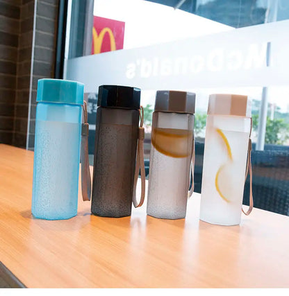 Portable Plastic Water Bottle Creative Matte Water Cup Outdoor Juice Leak-Proof Sports Bottle with Rope Travel Camping Bottles.