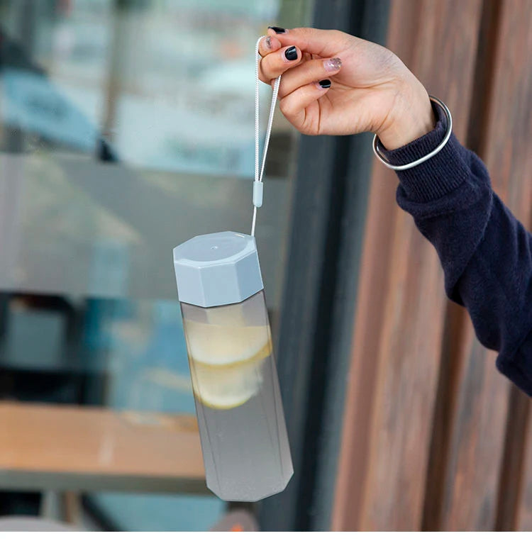 Portable Plastic Water Bottle Creative Matte Water Cup Outdoor Juice Leak-Proof Sports Bottle with Rope Travel Camping Bottles.