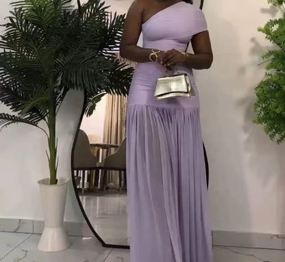 Women's 2025 Spring New Solid Color Sleeveless Slant Neck Pleated Slim Split Long Dresses.