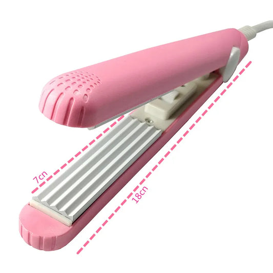 A mini hair iron pink corrugated plate electric curling iron curl modelling tools.