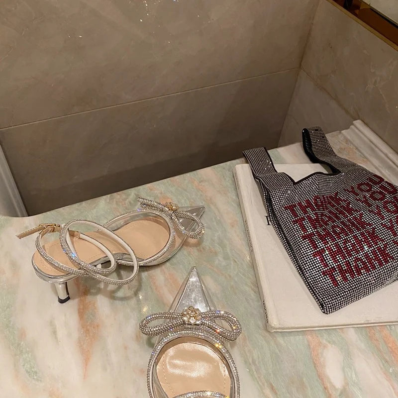 2025 New Fashion Glitter Rhinestones Women Pumps Crystal Bowknot Silk Pointed Toe Buckle Strap Thin High Heels Party Prom Shoes.