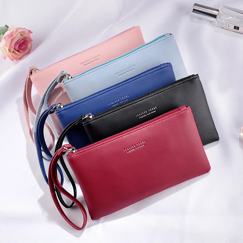 New mobile phone bag female long zipper coin purse female Korean version of pure color wild card bag mobile phone bag wallet.