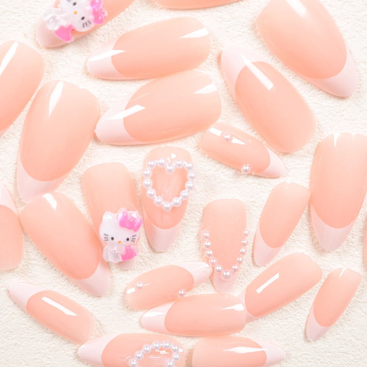 24PCS Almond Armor Sanrio White French Hello Kitty Diamond 3d White Pearl Love Diamond Wear Armor suit.