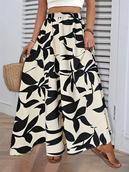 Fairyshely Casual Leaf Print Long Skirt For Women 2025 Summer Ruffle High Waist Maxi Skirt Ladies Elegant A line Pleated Skirt.