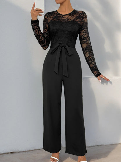 Woman Black Lace Sleeve Jumpsuit Round Neck Belted Waist Ideal for Evening Parties and Cocktail Events.