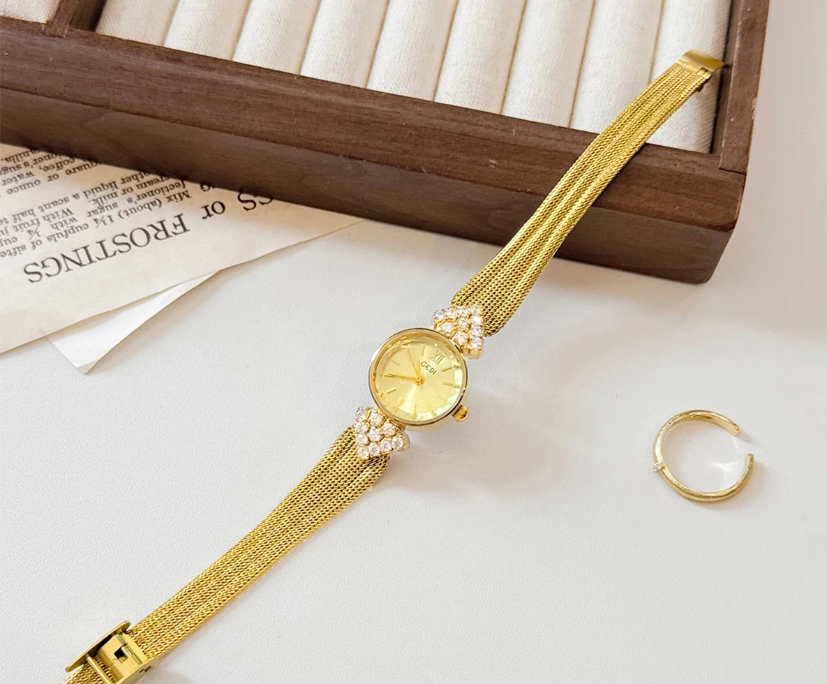 GEDI Watch Gold Silver Diamond Inlaid Steel Strip Women's Wristwatch Vintage Niche Light Luxury Temperament Quartz Watch Woman.