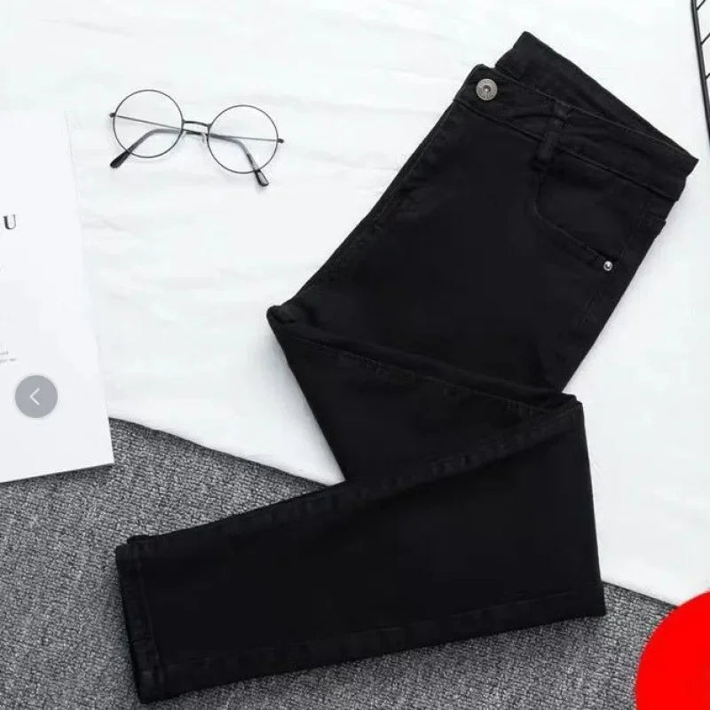 High Waist plus Size Denim Jeans Women's Fitting Pencil Pants Elastic Casual Long Trousers Light Blue Spring Autumn Wear.