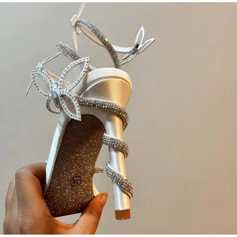 Luxury Crystal Embellished Butterfly Detail Women Sandals Sexy Coiled Strap Thin High heels Gladiator sandals Summer Party Shoes.
