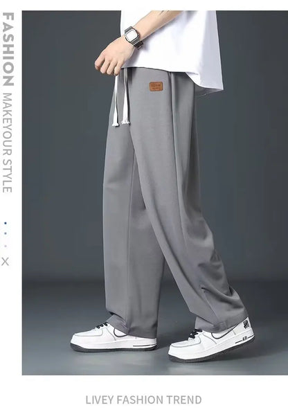 Casual long pants for boys, ice silk quick drying pants for spring and summer, thin, trendy brand straight tube, loose, hanging.