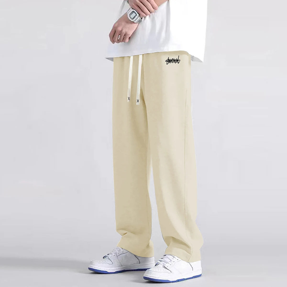 Men's solid color straight leg jogging pants, suitable for casual sports such as running, gym, and outdoor activities.