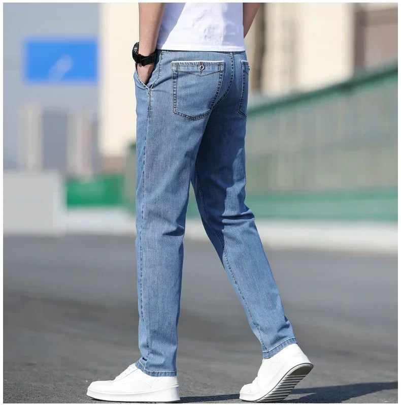 2025 sommer Neue männer Lose Grau Jeans Mode Lässig Stretch Gerade bein Denim Hosen Männlich Hellblau männer Hosen.