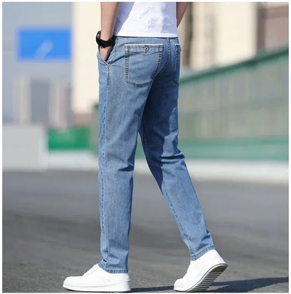 2025 sommer Neue männer Lose Grau Jeans Mode Lässig Stretch Gerade bein Denim Hosen Männlich Hellblau männer Hosen.