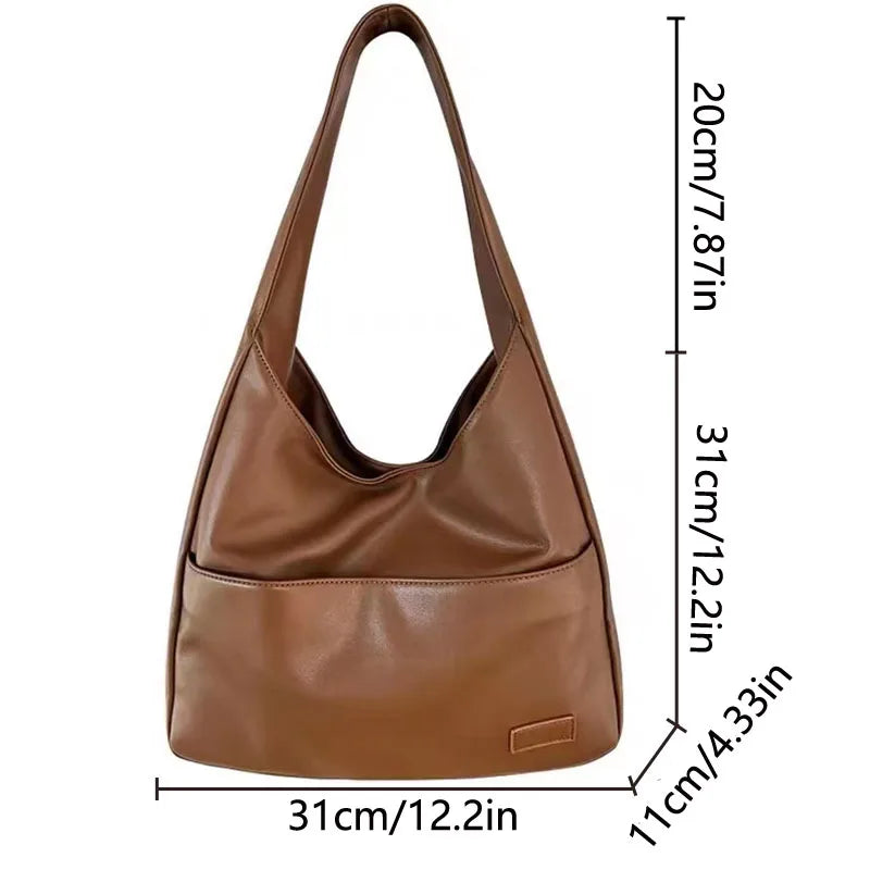 Large capacity tote bag, new black leather simple casual commuting women's bag, fashionable and versatile single shoulder bag.