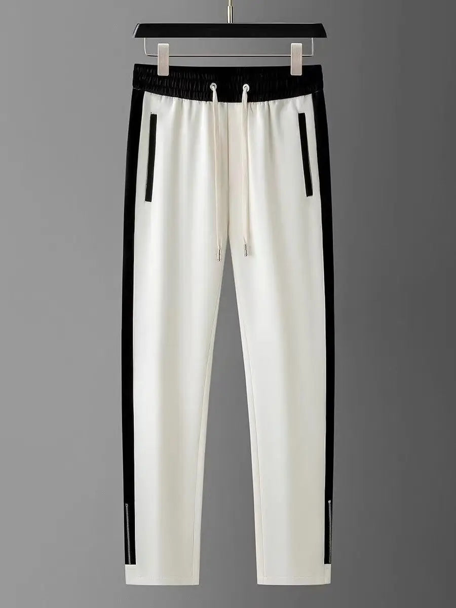 Autumn Winter Casual Pants Men Fitness Sportswear Tracksuit Bottoms Skinny Sweatpants Cotton Trousers Track Pants.