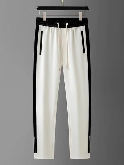 Autumn Winter Casual Pants Men Fitness Sportswear Tracksuit Bottoms Skinny Sweatpants Cotton Trousers Track Pants.