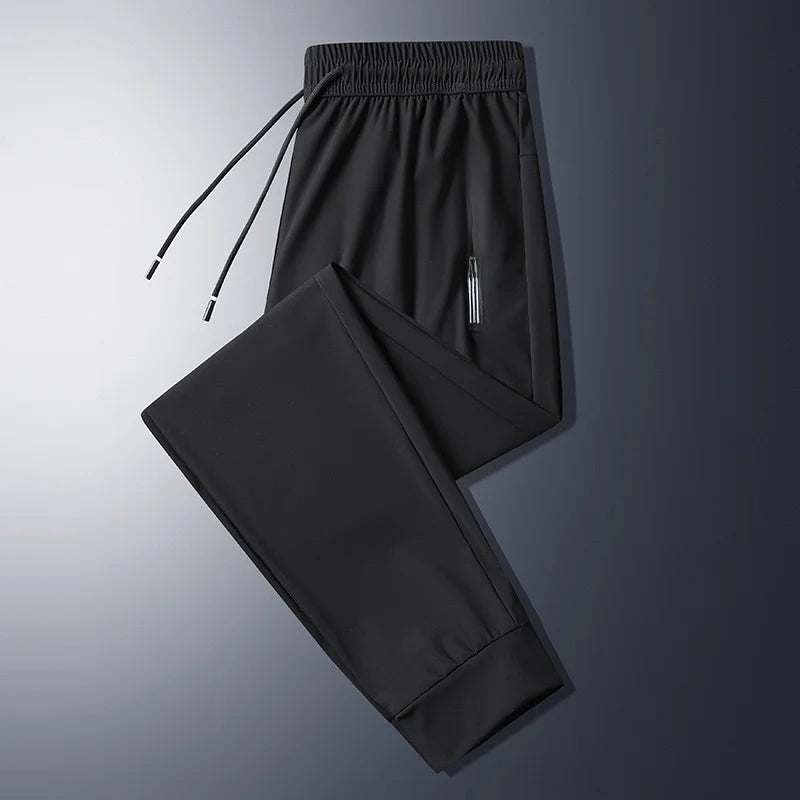 Men Summer Thin Ice Silk Pants Loose Style Workwear Casual Quick Dry Sports Pants Long Breathable High Elasticity.