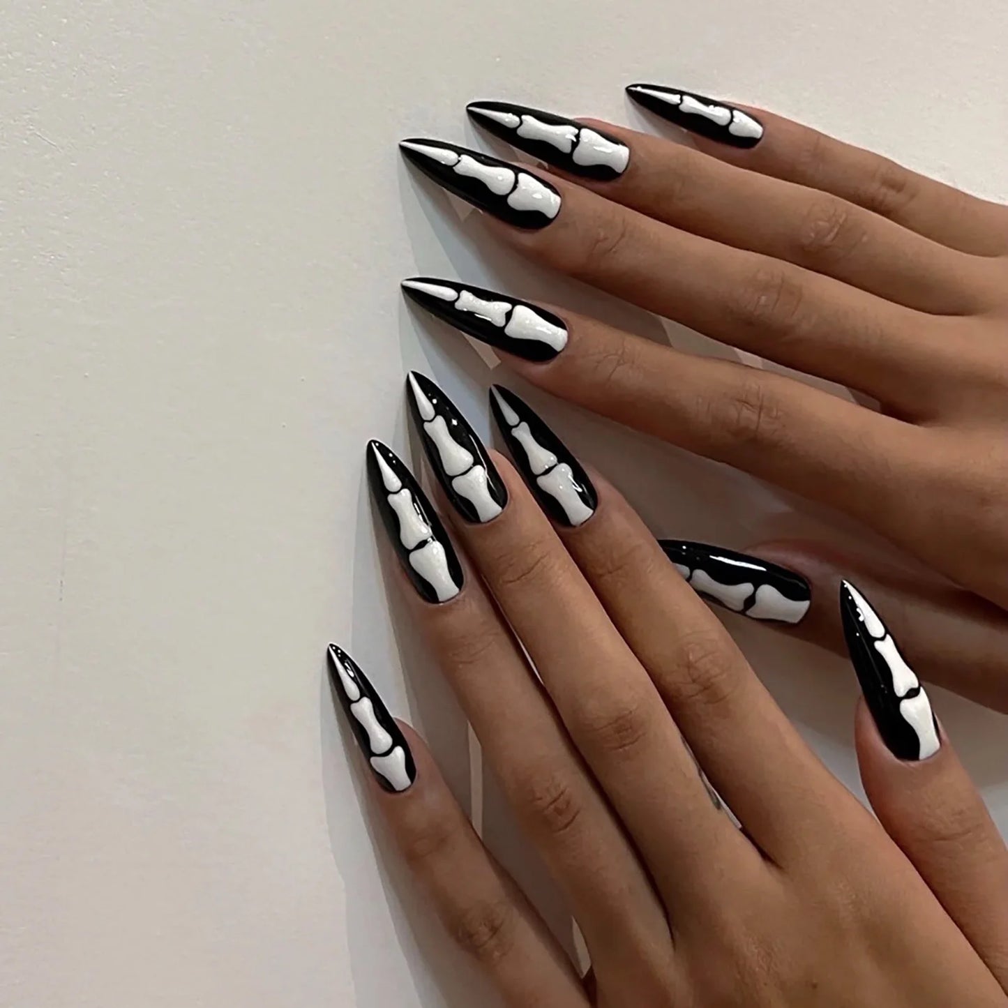 24Pcs Gothic Halloween Press On Nails - Creepy Skeleton Finger Fake Nails, Long Almond Black/White Acrylic False Nails Patches.