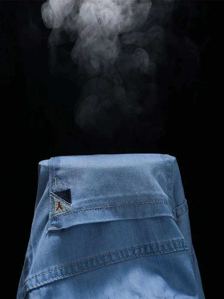 Summer Ultra Thin Men's Loose Jeans Lyocell Ice Silk Fashion Casual Business Denim Pants Straight Stretch Male Trousers.