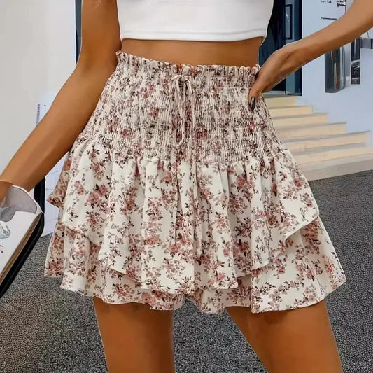 Women's Casual Floral Print Shorts Skirt 2024 Summer Vintage Women's High Waist Pleated Mini Skirt Fashion Loose Elastic Shorts.