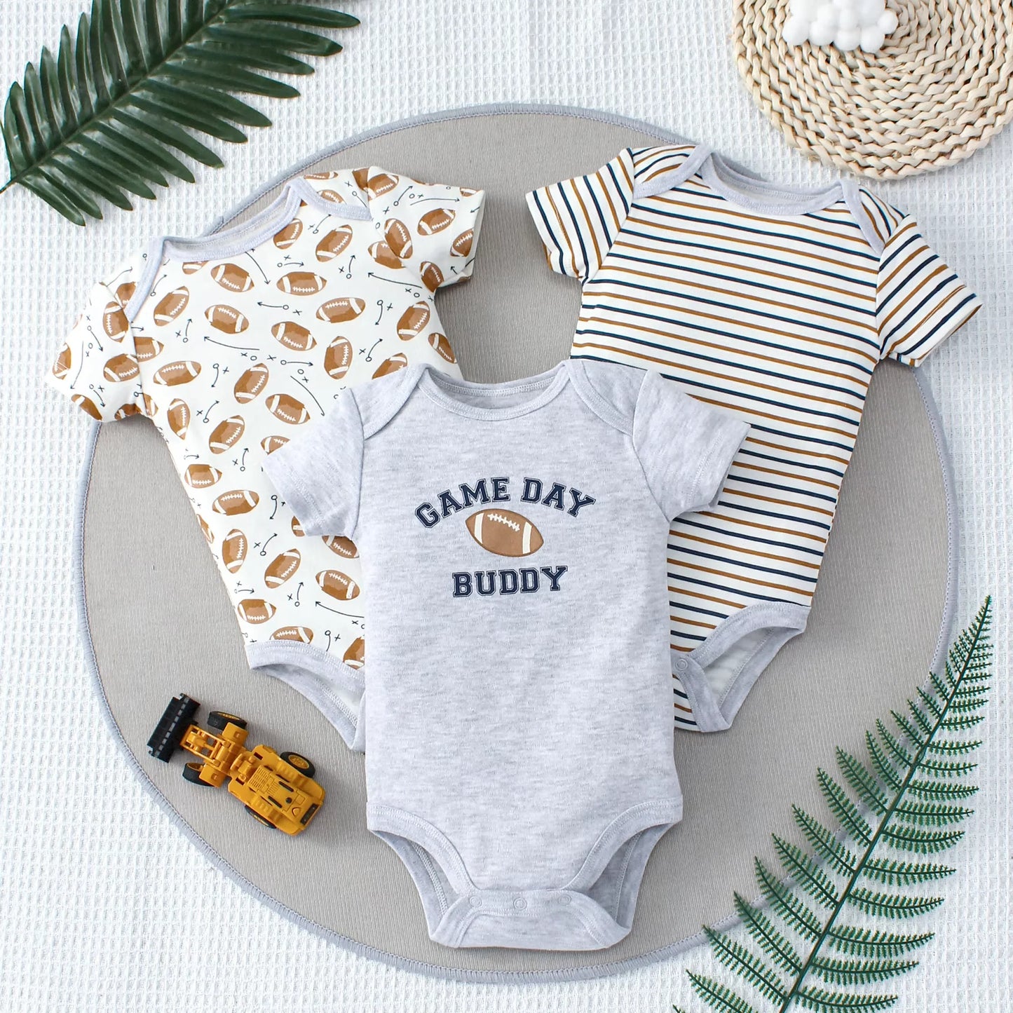 3-teiliges Sommer-Baby-Body, dreiteiliges Set mit Cartoon-Dinosaurier-Muster und Streifenmuster, Knopf-Design für Jungen im Alter von 0–9 Monaten.