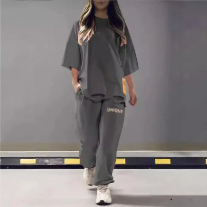 Summer New Fashion Hollowed Out O Neck T Shirt Women's 2 Piece Set Solid Color Casual Relaxed Tracksuit Pants Pocket Female Suit.