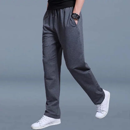 2025 New Men Casual Fashion Sports Pants Gym Sport Trousers Male Jogger SweatpantsRunning Workout Jogging Long Trousers.