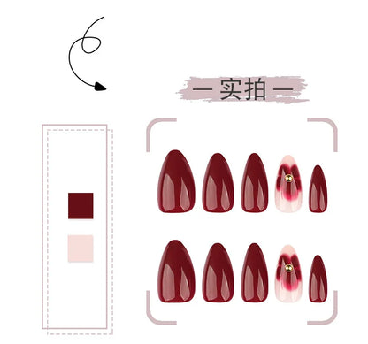 24pcs Women'S Nail Set Burgundy Almond Shape Medium Length Solid Color with Floral Golden Dust Design Fake Nails for Women/Girls.