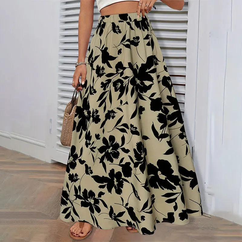 Fairyshely Casual Leaf Print Long Skirt For Women 2025 Summer Ruffle High Waist Maxi Skirt Ladies Elegant A line Pleated Skirt.