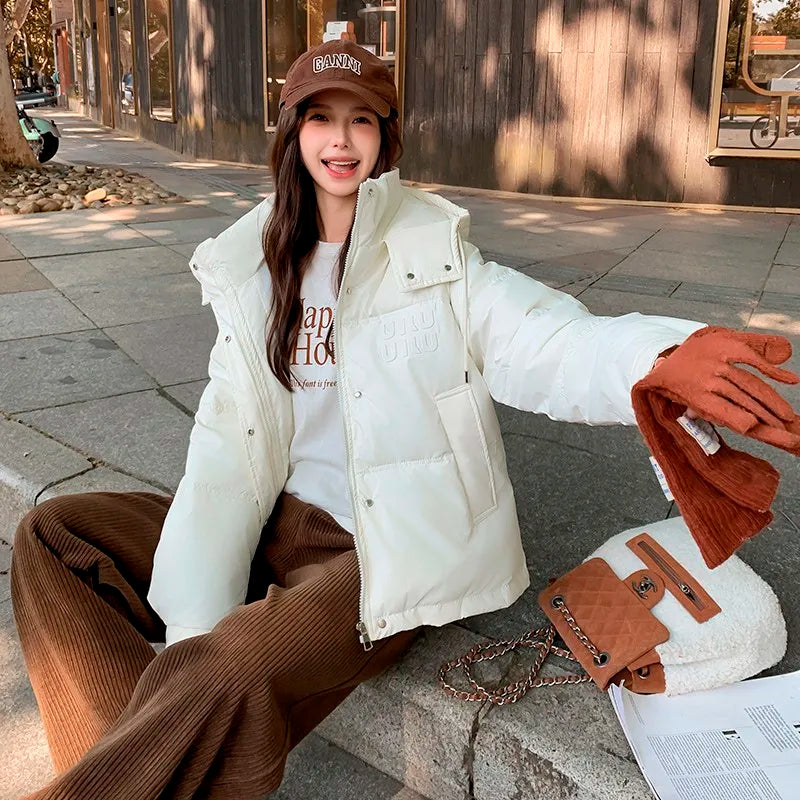 2024 Winter Neue frauen Unten Baumwolle Gefütterte Jacken Stilvolle Mit Kapuze Einfarbig Casual Verdicken Warme Lose anliegende kurze Mäntel