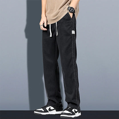 2024 Spring/Summer New Soft Lyocell Fabric Men's Jeans Thin Loose Straight Leg PantsDrawstring Elastic Waist Korean casual pants.