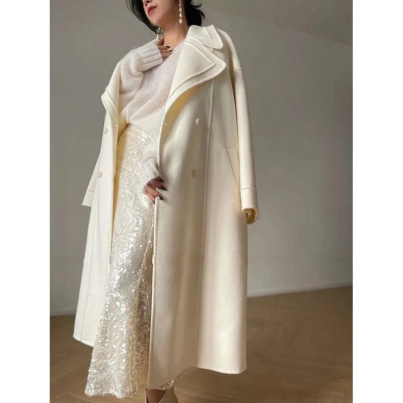 Weißer Mantel im französischen Stil, High-End-Temperament, Herbst-Winter, langer Wollmantel, 2025, neuer Damen-Wollmantel, modische lose Oberbekleidung.