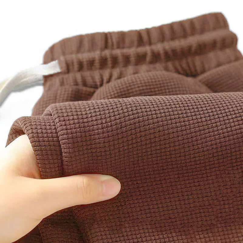 Men's retro knitted Waffle sweatpants, loose straight leg solid color pants with elastic waist and drawstring, suitable for autu.