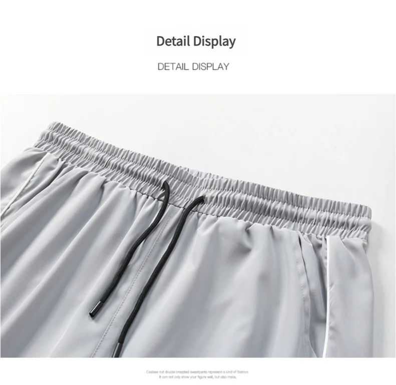 Summer ice silk thin section pants men's Hong Kong style loose splicing casual sports wide-legged pants elastic speed pants